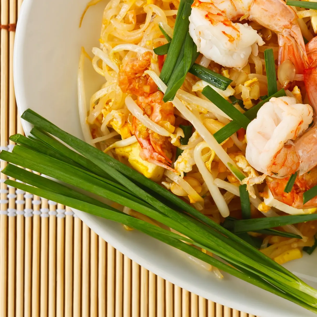 Shrimp pad Thai with bean sprouts and garlic chives