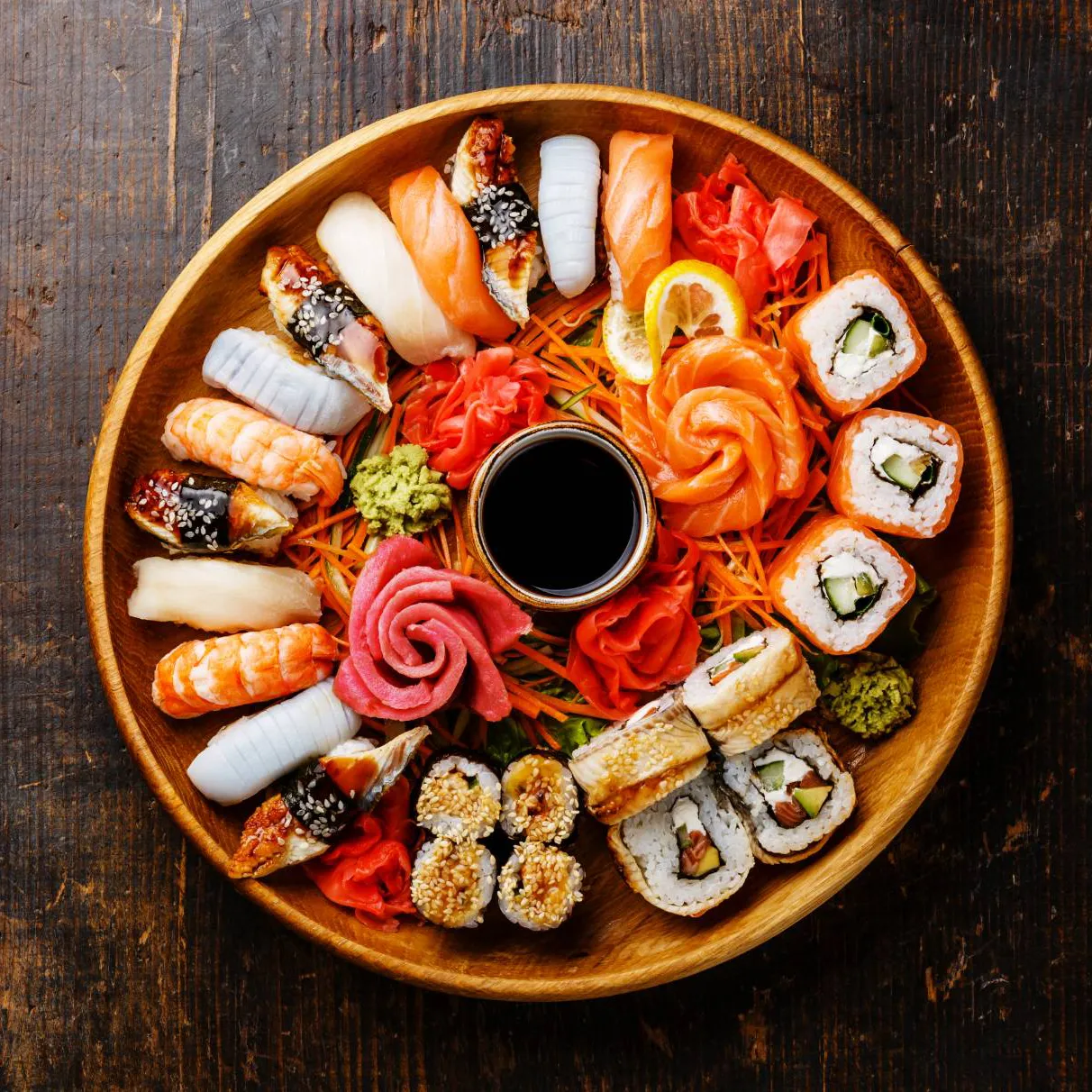 Sushi and sashimi platter with nigiri and maki rolls